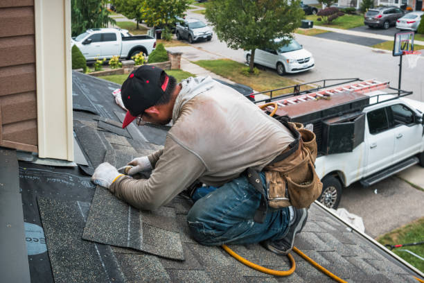 Professional Roofing technician working in Woodbine, MD